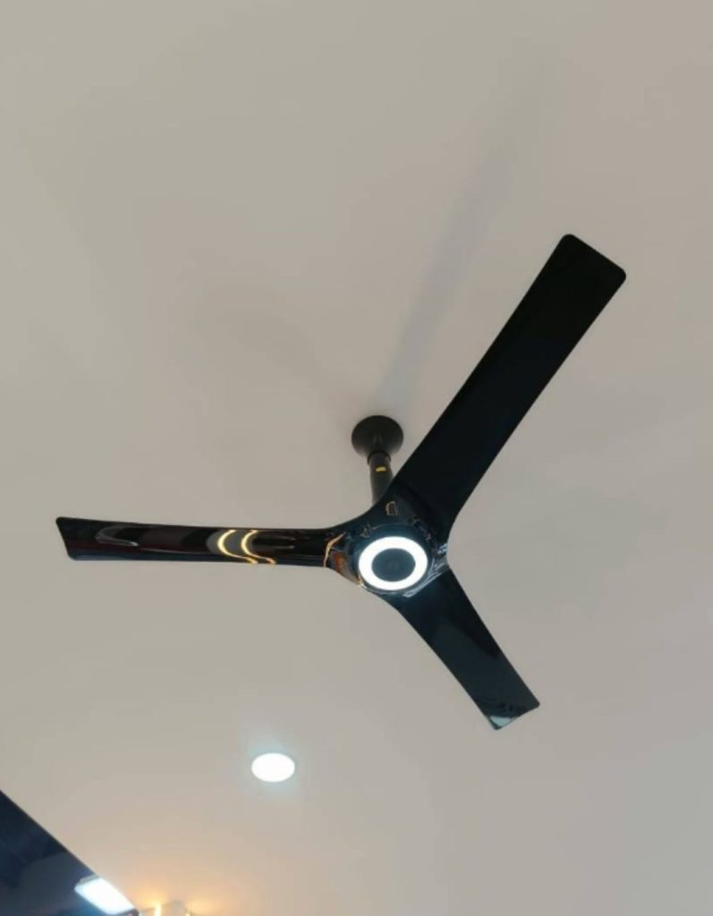 Close view of Atomberg Aris Starlight Smart 1400mm BLDC ceiling fan, highlighting the three-blade design and modern finish