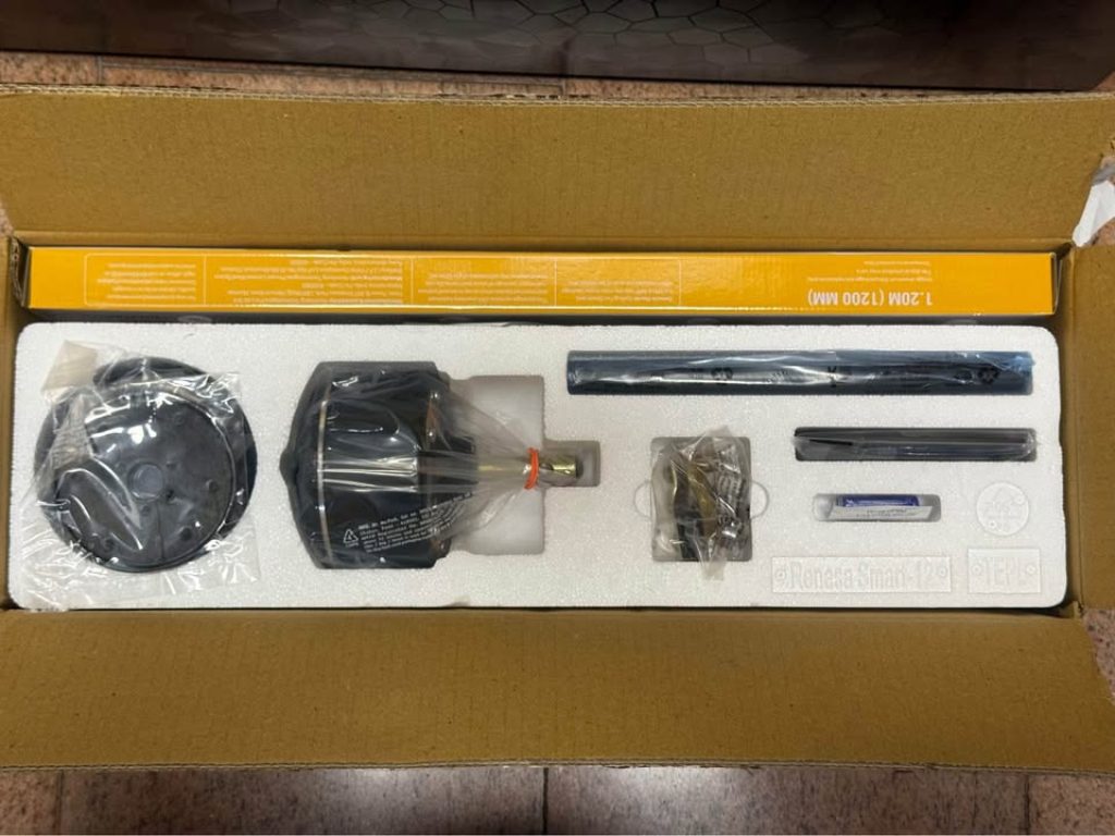 Atomberg Renesa Halo Smart BLDC ceiling fan box opened to show organized internal packaging and included components