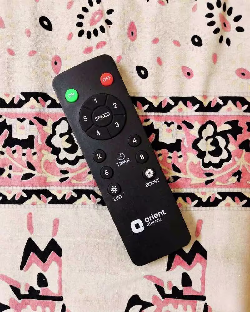 Orient Electric Proton 1200mm BLDC ceiling fan remote with speed control, timer, LED and boost buttons