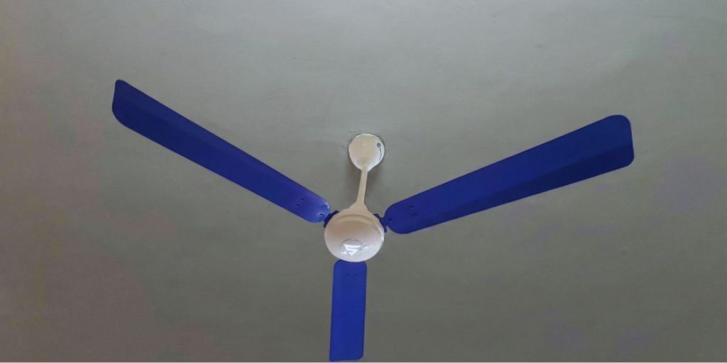 Superfan SuperV1 1400 mm BLDC ceiling fan with blue blades mounted on a white ceiling